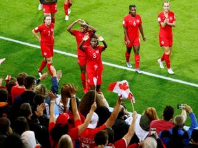 Canada's players applaud fans after a 2019 Women's World Cup match against New Zealand at Stade des Alpes in Grenoble, France, on Saturday, June 15, 2019.