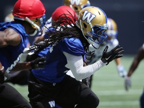 Kerfalla Exume blasts down the field during a special teams drill at Blue Bombers practice yesterday. (Kevin King/Winnipeg Sun)