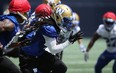 Kerfalla Exume blasts down the field during a special teams drill at Blue Bombers practice yesterday. (Kevin King/Winnipeg Sun)