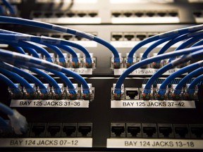 Networking cables and circuit boards are shown in Toronto on Wednesday, November 8, 2017. The federal government is promising to piggyback on existing projects and networks as much as possible to expand broadband access to rural communities as part of two reports being made public today.