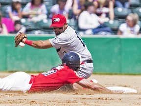 Goldeyes’ Wes Darvill steals second on Drew Stankiewicz and the Sioux City Explorers during June 4 action at Shaw Park. 
(DAN LeMOAL/Winnipeg Goldeyes)