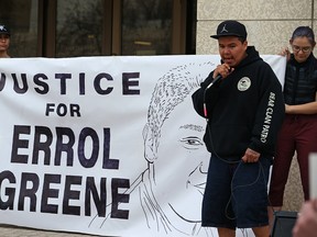 Tyler Harper raps a song during a vigil for Errol Greene outside the Winnipeg Remand Centre on the one-year anniversary of his death in custody on Mon., May 1, 2017. An inquest into the death of Greene, 26, was called in December while his widow, Rochelle Pranteau, is suing the province for failing to provide the necessities of life.  A Manitoba judge is calling for a full review of health care services at the Winnipeg Remand Centre, where an inmate died after suffering seizures. Provincial court judge Heather Pullan says nurses and correctional officers at the centre should be trained in how to handle seizures, and an independent body should be hired to review the centre's medical unit.
Kevin King/Winnipeg Sun/Postmedia Network