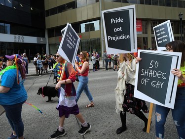The Winnipeg Public Library group has fun with puns at the annual Pride parade through the streets of Winnipeg on Sun., June 2, 2019. Kevin King/Winnipeg Sun/Postmedia Network