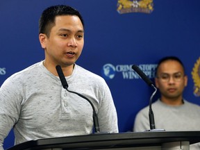 Edward Balaquit speaks to media about the disappearance of father Eduardo one year ago during a press conference at Winnipeg Police Service headquarters on Tuesday. His brother Edwin is to his left.