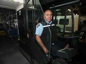 Angel, a transit bus operator, demonstrates a recently installed safety shield on a Winnipeg Transit bus. Thursday, June 6/2019 Winnipeg Sun/Chris Procaylo/stf