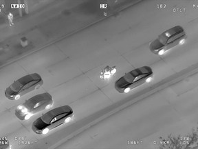 Image off Winnipeg Police Service AIR1 video of the pursuit and capture of a motorcyclist racing through Winnipeg streets.