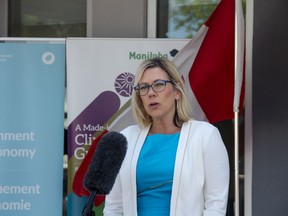 Manitoba Sustainable Development Minister Rochelle Squires announces the start of the $11.8 million Federal and Provincial partnership program, the Manitoba Efficient Trucking Initiative, on Monday at the Manitoba Trucking Association building in Winnipeg.
