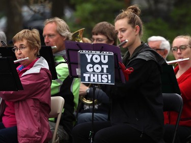 A member of the 'Marathon Band' playing to runners in Harrow Park delivers a message during the Manitoba Marathon on Sun., June 16, 2019. Kevin King/Winnipeg Sun/Postmedia Network