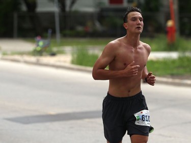 Manitoba Moose captain Peter Stoykewych runs along Guelph Street during the Manitoba Marathon on Sun., June 16, 2019. Kevin King/Winnipeg Sun/Postmedia Network