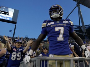 Winnipeg Blue Bombers receiver Lucky Whitehead celebrates in the stands after his second touchdown catch of the game against the Edmonton Eskimos during CFL action in Winnipeg on Thurs., June 27, 2019. Kevin King/Winnipeg Sun/Postmedia Network