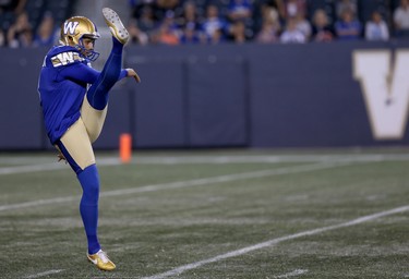 Winnipeg Blue Bombers punter Justin Medlock follows through on a kick during CFL action against the Edmonton Eskimos in Winnipeg on Thurs., June 27, 2019. Kevin King/Winnipeg Sun/Postmedia Network