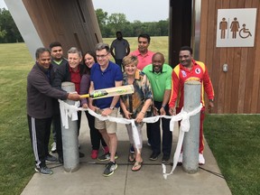 Local politicians and members of the Manitoba Cricket Association celebrate the official opening of newly-constructed four-season washrooms at La Barriere Park in Winnipeg on Saturday, June 29, 2019. (Left to right, starting third from left) MP Terry Duguid (Winnipeg South), Councillors Sherri Rollins (Fort Rouge-East Fort Garry), Brian Mayes (St. Vital), Janice Lukes (Waverley West) and Markus Chambers (St. Norbert).