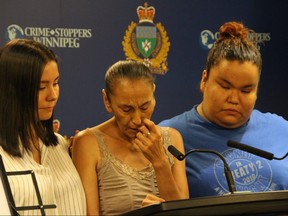 Sarah Coates (middle) pleads with Winnipeg's homeless community to help police find out who killed her brother, 44-year-old Gabriel Coates, on June 19. Sarah and her daughters Dawna (left) and Marina (right) spoke at a Winnipeg Police Service press conference on July 5, 2019.
Danton Unger/Winnipeg Sun/Postmedia Network