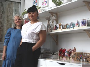 Brandi Baldwin (left) and Miriam Delos Santos (right) are two of the six mothers who have created the Mothership Pop-up shop in Winnipeg. 
Danton Unger/Winnipeg Sun/Postmedia Network