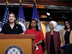 U.S. Rep. Alexandria Ocasio-Cortez (D-NY) speaks as Reps. Ayanna Pressley (D-MA), Ilhan Omar (D-MN), and Rashida Tlaib (D-MI) listen during a press conference at the U.S. Capitol on July 15, 2019 in Washington, D.C.
