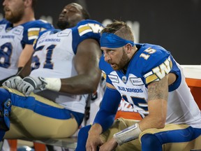 Winnipeg Blue Bombers quarterback Matt Nichols (15) on the bench after his final possession during second half CFL football game action against the Hamilton Tiger-Cats in Hamilton, Ont. on Friday, July 26, 2019. THE CANADIAN PRESS/Peter Power
