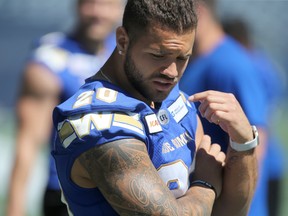 Blue Bombers’ Brady Oliveira went down with a broken leg during last week’s win over the Edmonton Eskimos, but friend and teammate John Santiago is confident Oliveira will return stronger in due time. (Chris Procaylo/Winnipeg Sun)