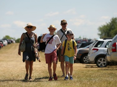 Heather Fisher and her husband Brian arrive at the Winnipeg Folk Festival with their children Logan and Bodhi on Saturday, July 13, 2019. This year's Winnipeg Folk Festival runs July 11 to 14 at Birds Hill Provincial Park, north east of Winnipeg, Man.