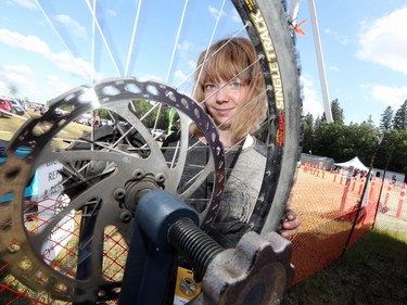 Jasmine Moffett-Steinke from Natural Cycle repairs a bike tire at the 46th annual Winnipeg Folk Festival at Birds Hill Provincial Park, north east of Winnipeg, Man., on Friday, July 12, 2019. This year's Folk Festival runs July 11 to 14, 2019.