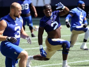 Jonathan Kongbo limbers up during Bombers practice last week. He’ll make his pro debut Thursday. (Kevin King/Winnipeg Sun)