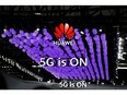 A Huawei logo and a 5G sign are pictured at Mobile World Congress (MWC) in Shanghai, China June 28, 2019.