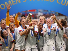 Alex Morgan and Carli Lloyd of the USA celebrate following their team's victory in the Women's World Cup final at Stade de Lyon on July 07, 2019 in Lyon, France. (Richard Heathcote/Getty Images)