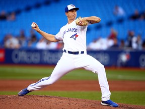 Jacob Waguespack of the Toronto Blue Jays delivers a pitch in the second inning during a MLB game against the Boston Red Sox at Rogers Centre on July 3, 2019 in Toronto.