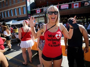 Anastasia Allan follows her heart to the Canada Day Street Festival on Osborne Street in Winnipeg on Monday.
