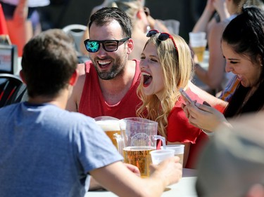 A man clowns around with a broken pair of sunglasses in a beer garden at the Canada Day Street Festival on Osborne Street in Winnipeg on Mon., July 1, 2019. Kevin King/Winnipeg Sun/Postmedia Network