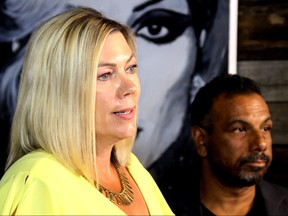 Rochelle Squires (left) MLA for Riel, and Atomic Hair Studio owner Daveen Singh (right), announce the Progressive Conservative party's plan to cut PST on personal care services at a press conference on Monday, July 15, 2019 in Winnipeg.