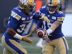 Bombers quarterback Matt Nichols (right) leads the CFL in touchdown passes and has completed just under 70% of his passes for 1,411 yards, while running back Andrew Harris (33) is off to another fantastic start and remains a duel threat, with 233 yards receiving to go with his 494 yards on the ground