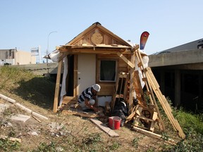 Allan Par, a homeless man living in Winnipeg, has built himself a makeshift house using wooden pallets and tarps, as a way to escape the elements.
