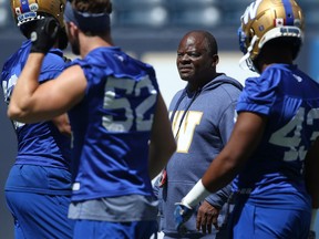 Defensive co-ordinator Richie Hall leads his defence during Winnipeg Blue Bombers practice on Tuesday.