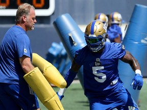 Defensive lineman Willie Jefferson (right) works with defensive line coach Glen Young during Winnipeg Blue Bombers practice on Tues., July 2, 2019. Kevin King/Winnipeg Sun/Postmedia Network