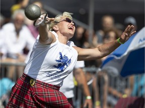 Winnipeg's Josee Morneau competes in the women's 2 stone throw during the Highland Games in Montreal, on Sunday.