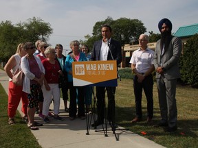 Joined by a group of Transcona constituents (left) and two NDP candidates (right), NDP leader Wab Kinew (centre) promises to build 80 new personal care home beds at the Park Manor personal care home in Transcona on Aug. 15, 2018.
Danton Unger/Winnipeg Sun/Postmedia Network