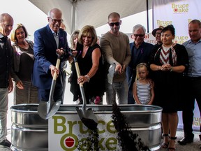Scott Oake (left), Anne Oake (centre), and Darcy Oake (right) officially break ground for the Bruce Oake Recovery Centre, a new long-term addictions treatment facility in Winnipeg on Thursday, Aug. 22, 2019. Danton Unger/Postmedia