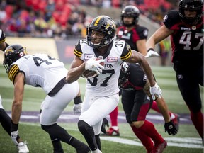 The Hamilton Tiger-Cats' Frankie Williams makes his way through the crowd during the first quarter of the game against the Ottawa Redblacks at TD Place on Saturday, Aug. 17, 2019.
