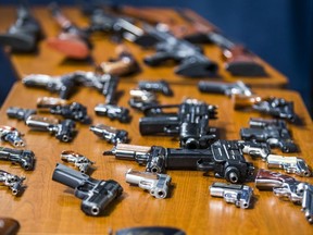 Toronto Police display some of the guns acquired as a following a Gun Buyback Program, during a press conference at police headquarters in Toronto, June 20, 2019. (Ernest Doroszuk/Toronto Sun/Postmedia)