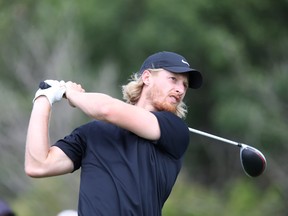 Jets forward Kyle Connor watches his drive during the Players Cup in Winnipeg on Thursday. (CHRIS PROCAYLO/WINNIPEG SUN)