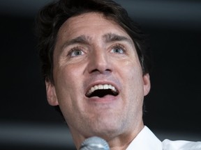 Prime Minister Justin Trudeau delivers remarks at the nomination meeting for Liberal candidate Elisabeth Briere in Montreal on Tuesday, August 20, 2019. A new poll suggests a scathing ethics report on Prime Minister Justin Trudeau's handling of the SNC-Lavalin affair hasn't so far hurt the Liberals' chances of re-election this fall -- and it hasn't helped the Conservatives.