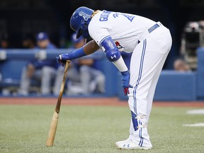 Blue Jays third baseman Vladimir Guerrero Jr. (27) reacts after taking a foul ball off his foot against the Texas Rangers at Rogers Centre. (John E. Sokolowski-USA TODAY Sports)