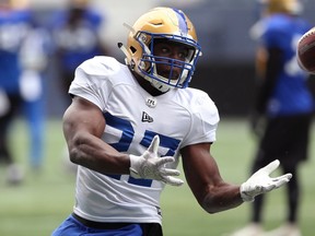 Running back Johnny Augustine makes a catch during Winnipeg Blue Bombers training camp at IG Field on Wed., May 22, 2019. Kevin King/Winnipeg Sun/Postmedia Network