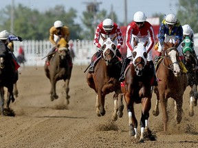 Oil Money (third from right) wins the Manitoba Derby at Assiniboia Downs on Mon., Aug. 5, 2019. Kevin King/Winnipeg Sun/Postmedia Network