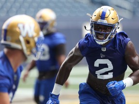 Defensive end Jonathan Kongbo chases his man during Winnipeg Blue Bombers practice at IG Field on Mon., Aug. 12, 2019.