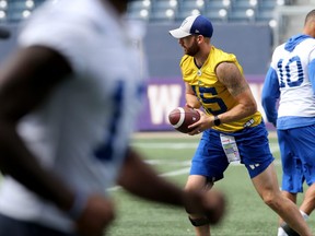 Quarterback Matt Nichols hands the ball off during the Winnipeg Blue Bombers walkthrough, ahead of Thursday's game against the B.C. Lions, at IG Field on Wed., Aug. 14, 2019. Kevin King/Winnipeg Sun/Postmedia Network