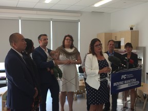 Heather Stefanson, Progressive Conservative candidate for Tuxedo, addresses the media at the press conference to announce plan to create a new child care funding program to help cover child care costs with a subsidy of up to $500 per month for 3,000 lower-income families at Living Prairie Childcare in Winnipeg on Sunday. Stefanson is flanked by fellow Progressive Conservative candidates.