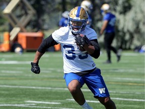 Running back Andrew Harris cuts with the ball during Winnipeg Blue Bombers practice on the University of Manitoba campus in Winnipeg on Mon., Aug. 19, 2019. Kevin King/Winnipeg Sun/Postmedia Network