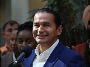 Manitoba NDP Leader Wab Kinew promises not to raise the carbon tax and give Manitobans a $350 rebate on Manitoba Hydro bills at a press conference in Winnipeg on Monday.