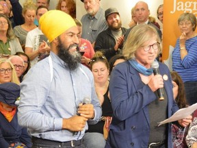 NDP Leader Jagmeet Singh breaks a toothy smile during a campagin stop in Sudbury this week with NDP candidate Beth Mairs. (Postmedia Network)